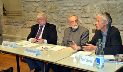 Philippe Mastronardi (facilitator) with Walter Fust (left) and Richard Gerster (right)