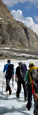 Crossing the melting glacier before climbing up to the Konkordia hut