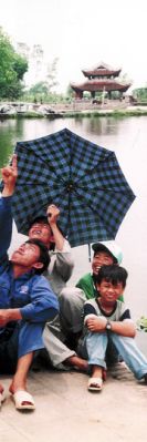 A Vietnamese family looking after doves of peace